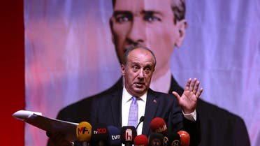 Former presidential candidate Muharrem İnce of the Republican People's Party (CHP) addresses a press conference as he stands in front of an imgae of Kemal Ataturk, known as the 'Father of Turks' in Ankara on August 13, 2020. (Adem Altan/AFP)