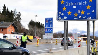 Motorists are checked by police at the Marktschellenberg border crossing near Salzburg as Austria reduces its lockdown restrictions on February 8, 2021 amid the ongoing coronavirus COVID-19 pandemic. (Barbara Gindl/APA/AFP)