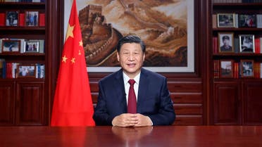 In this photo released by China’s Xinhua News Agency, Chinese President Xi Jinping delivers a New Year’s address in Beijing, Thursday, Dec. 31, 2020. (Ju Peng/Xinhua via AP)