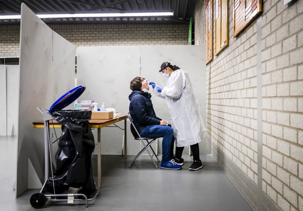 A resident of the Lansingerland municipality gets tested for the Covid-19 in Bergschenhoek, on January 13, 2021, as the UK variant of the disease has been detected. (File photo: AFP)