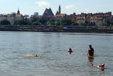 People bathe in the Wisla river in Warsaw, Poland (File photo: AFP)
