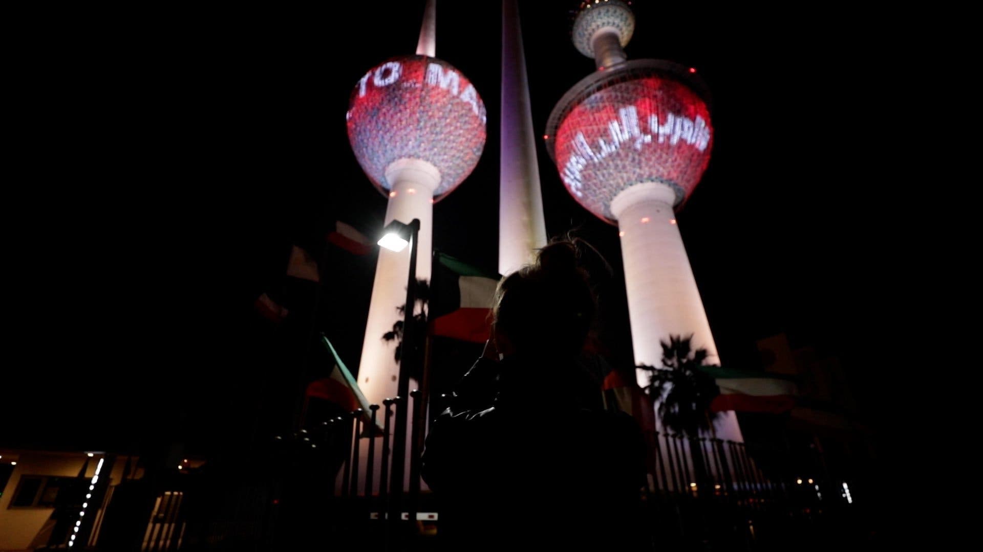 A building in Kuwait turns red for the UAE's Hope probe mission to Mars. (Twitter)