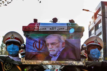 Iranian forces carrying the coffin of slain top nuclear scientist Mohsen Fakhrizadeh during his funeral ceremony in Iran's capital Tehran. (AFP)