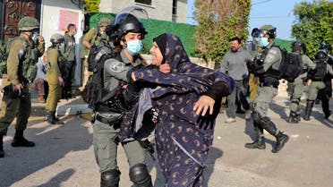 Palestinians clash with Israeli security forces as they prepare to demolish the house of Palestinian Mohammed Cabha in the West Bank village of Tura al-Gharbiya near Jenin, on February 10, 2021. (Jaafar Ashtiyeh/AFP)