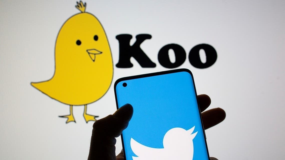Twitter logo is seen on smartphone in front of displayed Koo app logo in this illustration taken, February 10, 2021. (Reuters)