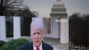 A video billboard calling for the conviction of former US President Donald Trump plays near the Capitol, Feb. 12, 2021. (AFP)