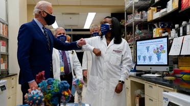 President Joe Biden greets Kizzmekia Corbett, an immunologist with the Vaccine Research Center at the National Institutes of Health (NIH), Feb. 11, 2021. (AP)