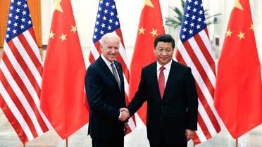Chinese President Xi Jinping shakes hands with then-VP Joe Biden in Beijing, Dec. 4, 2013. (File Photo: Reuters)