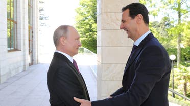 Russian President Vladimir Putin welcomes Syrian President Bashar al-Assad during their meeting in the Black Sea resort of Sochi, Russia May 17, 2018. Sputnik/Mikhail Klimentyev/Kremlin via REUTERS ATTENTION EDITORS - THIS IMAGE WAS PROVIDED BY A THIRD PARTY. TPX IMAGES OF THE DAY