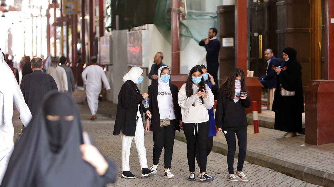 Kuwaiti women wear protective masks at the Mubarakiya Market in Kuwait City on February 24, 2020. (AFP)