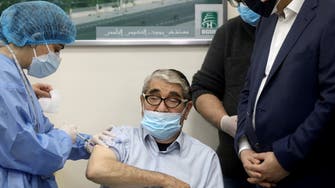 Lebanon begins COVID-19 vaccination drive, PM says will wait his turn  
