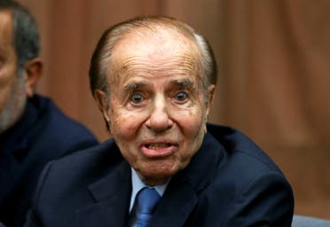 Former Argentine President Carlos Menem looks on in a court room before hearing the verdict in the trial of covering up the 1994 AMIA bombing, in Buenos Aires, Argentina February 28, 2019. (Reuters)