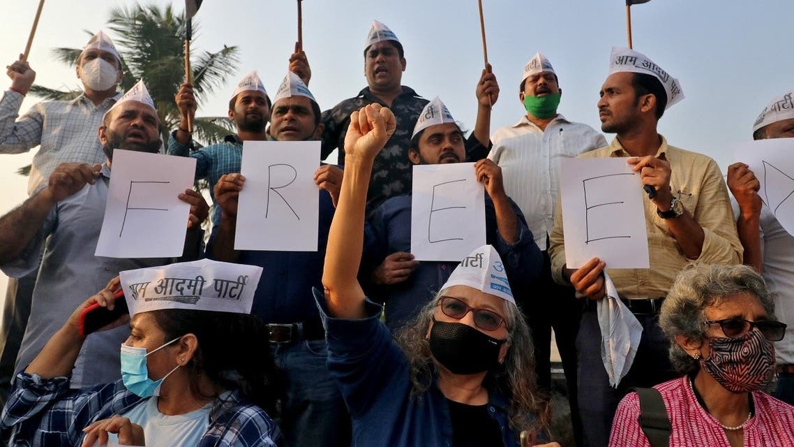Supporters of Aam Aadmi Party (AAP) shout slogans during a protest against the arrest of 22-year-old climate activist Disha Ravi, in Mumbai, India, February 15, 2021. (Reuters)