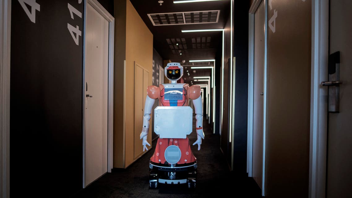 A robot by CTRL Robotics company provides room service in the Sky Hotel in Sandton, South Africa, on January 29, 2021. (AFP)