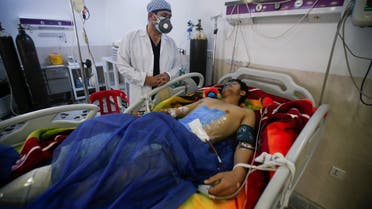 A man is treated at a hospital after he was injured during last night's rocket attack on U.S.-led forces in and near Erbil International Airport, in Erbil, Iraq February 16, 2021. REUTERS/Azad Lashkari