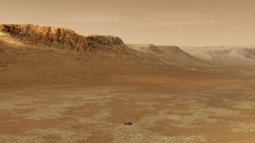 This NASA handout illustration obtained February 15, 2021 shows NASA’s Perseverance rover exploring inside Mars’ Jezero Crater. (AFP)
