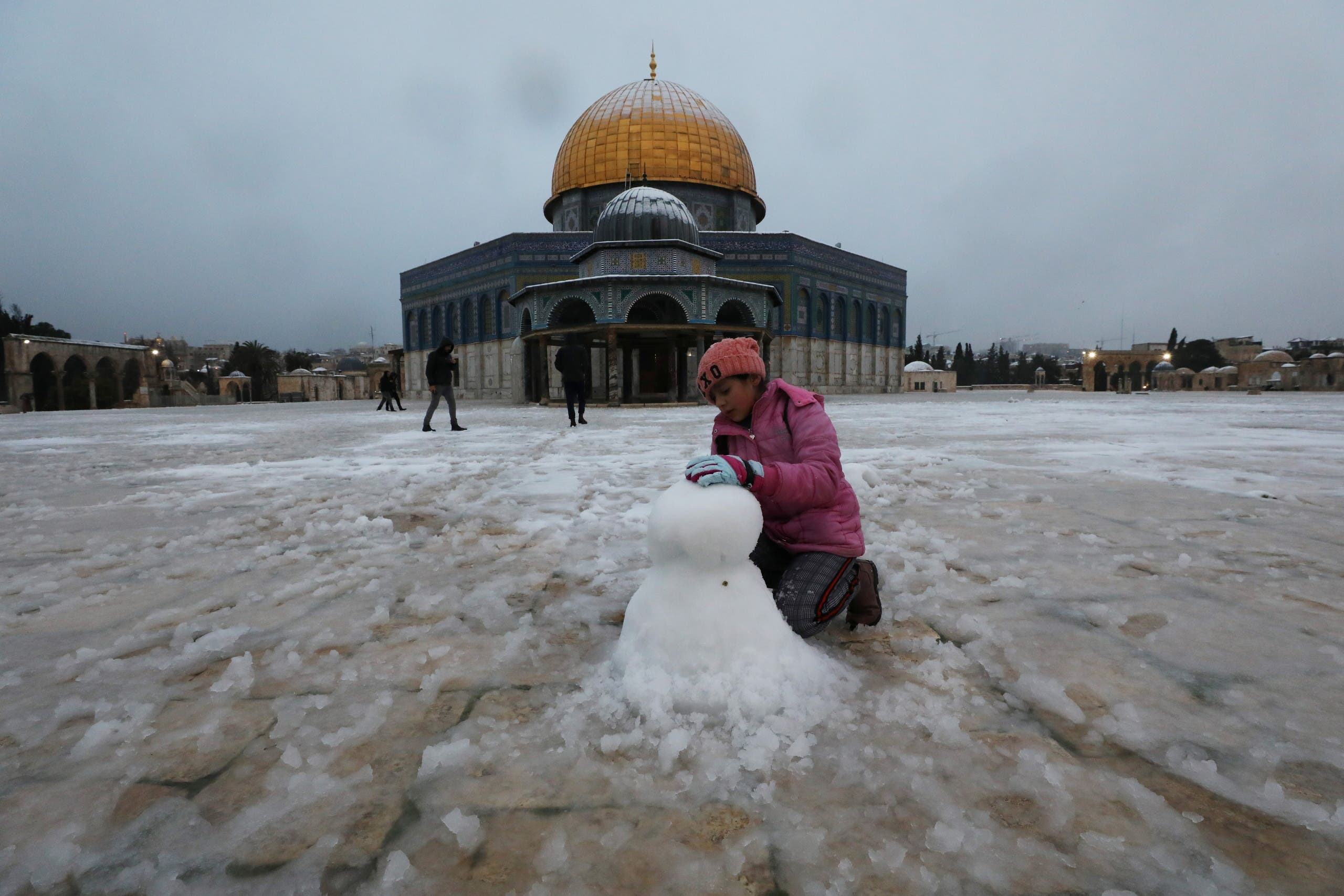 Snow in the Middle East Jerusalem’s holy sites appear under a layer of