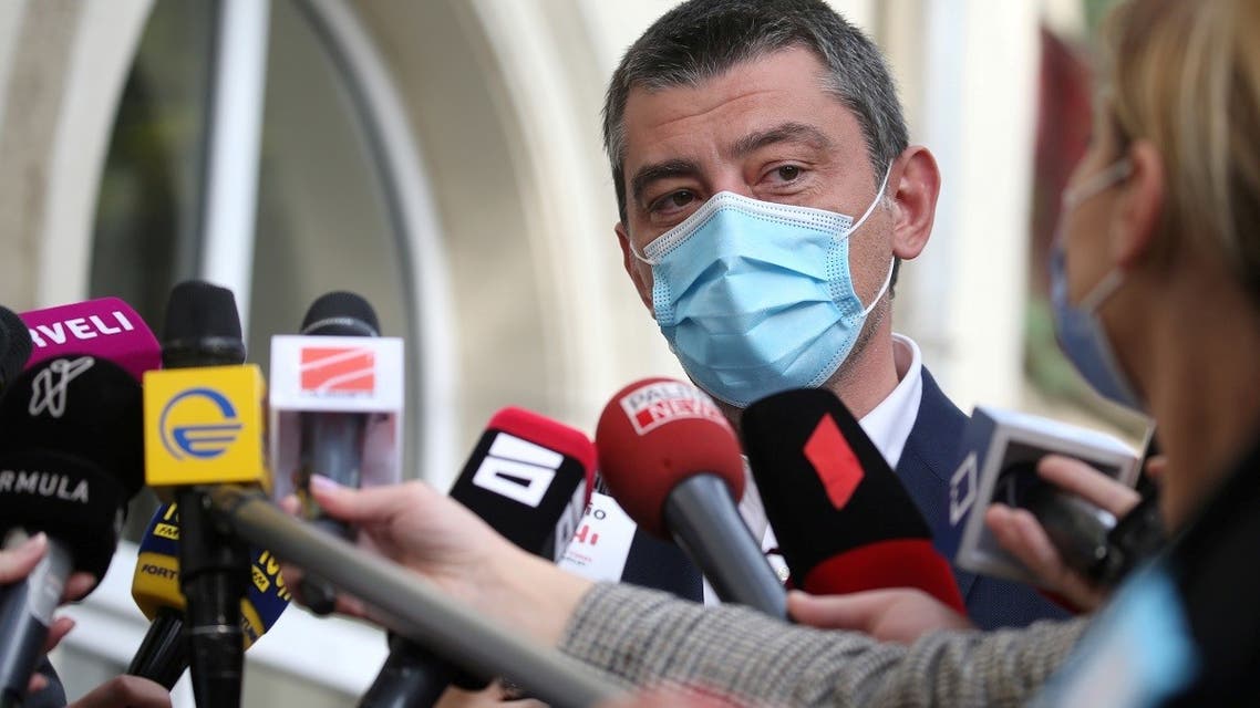 Georgia’s Prime Minister Giorgi Gakharia speaks to the media as he visits a polling station during a parliamentary election in Tbilisi, Georgia October 31, 2020. (Reuters)