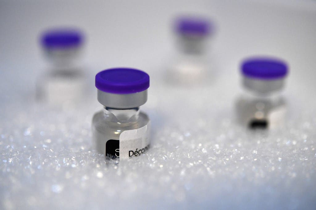 Phials of the Pfizer-BioNtech Covid-19 vaccine, are stocked on a freezer at low temperatures at a vaccination centre in Quimper, western France, on February 16, 2021. (AFP)