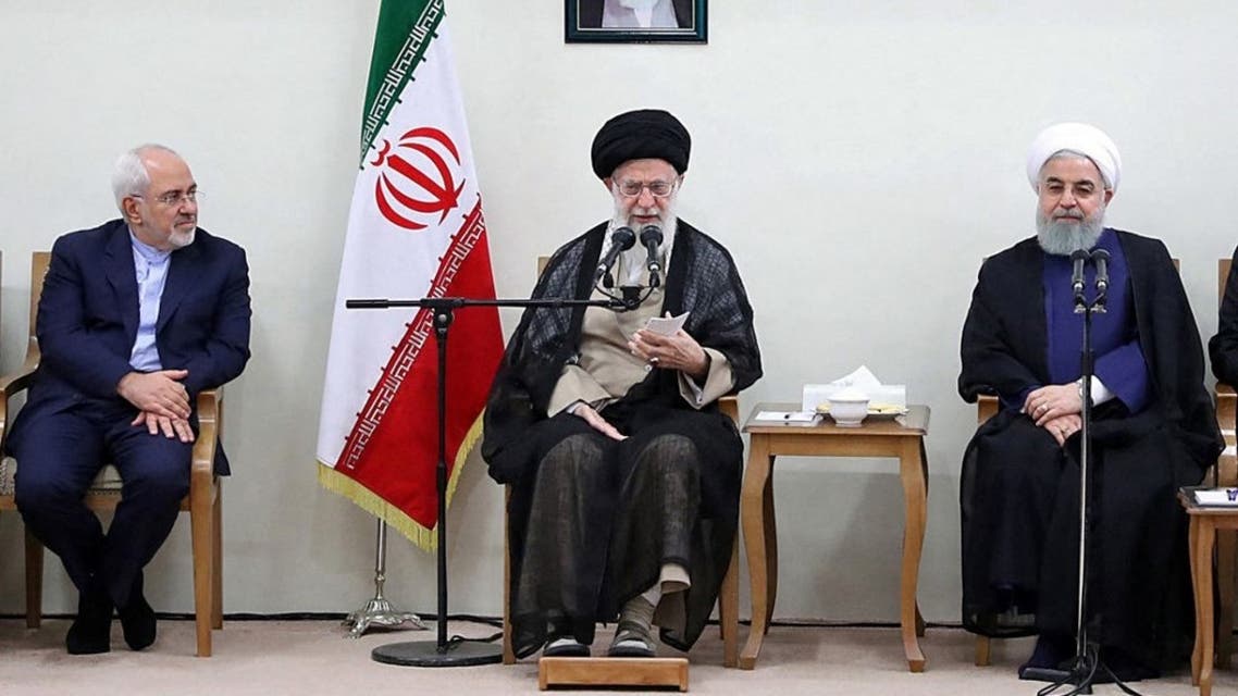 A handout picture provided by the office of Iran's Supreme Leader Ayatollah Ali Khamenei on July 15, 2018 shows Khamenei (C) sitting between President Hassan Rouhani (R) and Foreign Minister Mohammad Javad Zarif (L) during a government meeting in the capital Tehran. (AFP)
