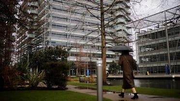 A pedestrian walks past an office block that houses the offices of China's CGTN Europe (China Global Television Network), in Chiswick Park, west London on February 4, 2021. (Tolga Akmen/AFP)