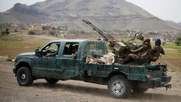 Houthi fighters man a machine gun mounted on a military truck as they parade during a gathering of Houthi loyalists on the outskirts of Sanaa. (File photo: Reuters)