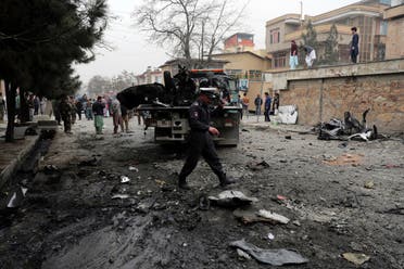  Security personnel inspect the site of a bomb attack in Kabul, Afghanistan, Saturday, Feb. 20, 2021. (AP)
