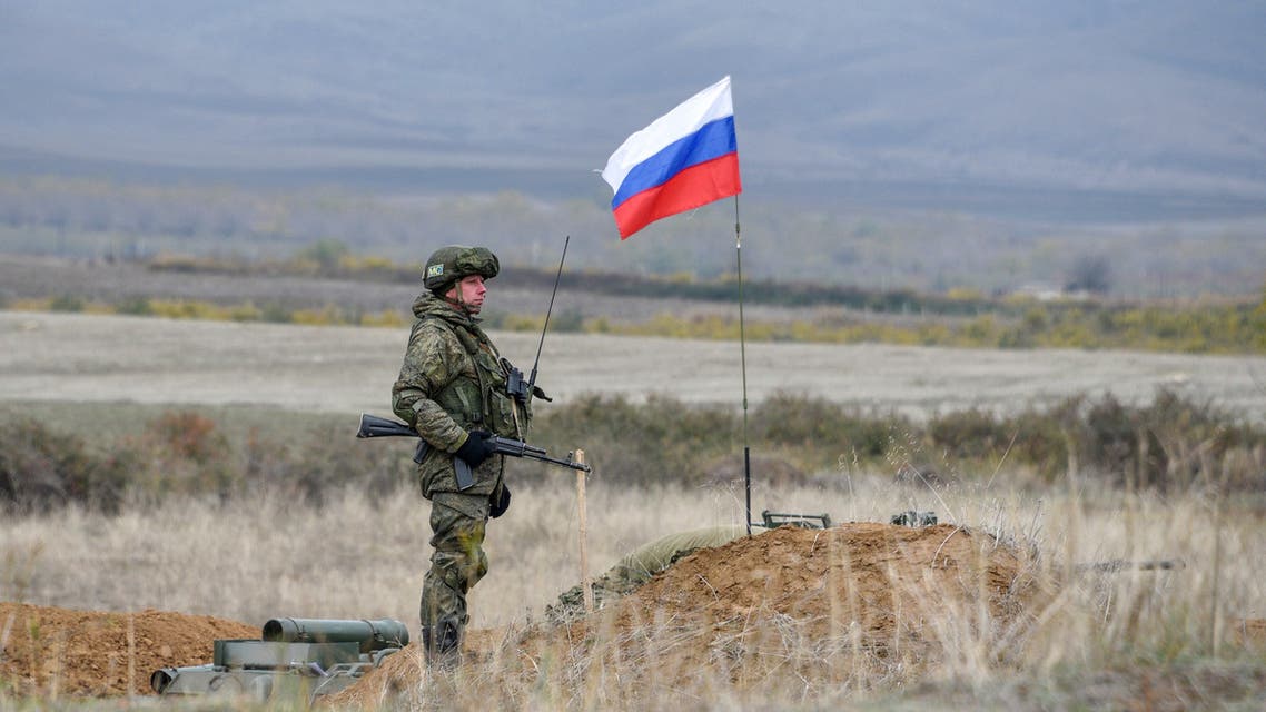 A Russian peacekeeper patrols at the check point outside Askeran on November 20, 2020. (AFP)