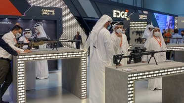 People are seen at the EDGE exhibit in the International Defense Exhibition, Abu Dhabi, United Arab Emirates February 22, 2021. (Reuters/Abdel Hadi Ramahi)