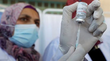 Palestinian health workers are vaccinated against COVID-19 in Bethlehem. (Reuters)