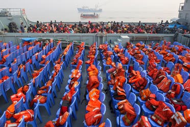 Life vests are placed on chairs as Rohingya refugees headed to the Bhasan Char island arrive to board navy vessels from the south eastern port city of Chattogram, Bangladesh, Monday, Feb.15,2021. (AP)