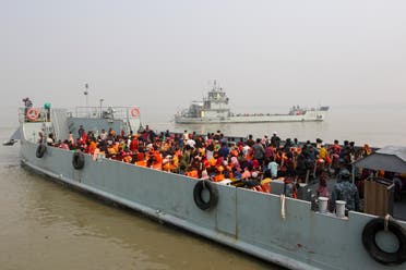 Rohingya refugees headed to the Bhasan Char island leave on navy vessels from the south eastern port city of Chattogram, Bangladesh, Monday, Feb.15,2021. (AP)