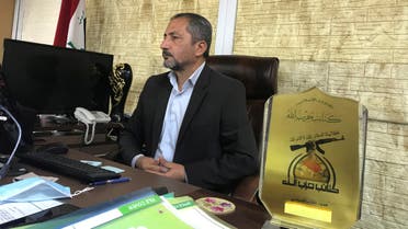 Mohammed Mohi, spokesman for Kataib Hezbollah paramilitary group attends an interview with Reuters in Baghdad, Iraq October 11, 2020. (Reuters)