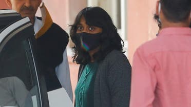 Disha Ravi, a 22-year-old climate activist, leaves after an investigation at National Cyber Forensic Lab, in New Delhi, India, on February 23, 2021. (Reuters)