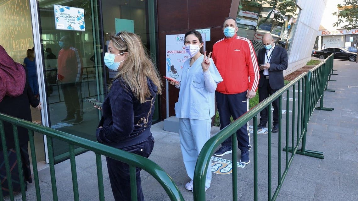 People queue to receive the COVID-19 Pfizer/BioNTech vaccine at Lebanon’s American University Medical Center in the capital Beirut, on February 14, 2021. (Anwar Amro/AFP)