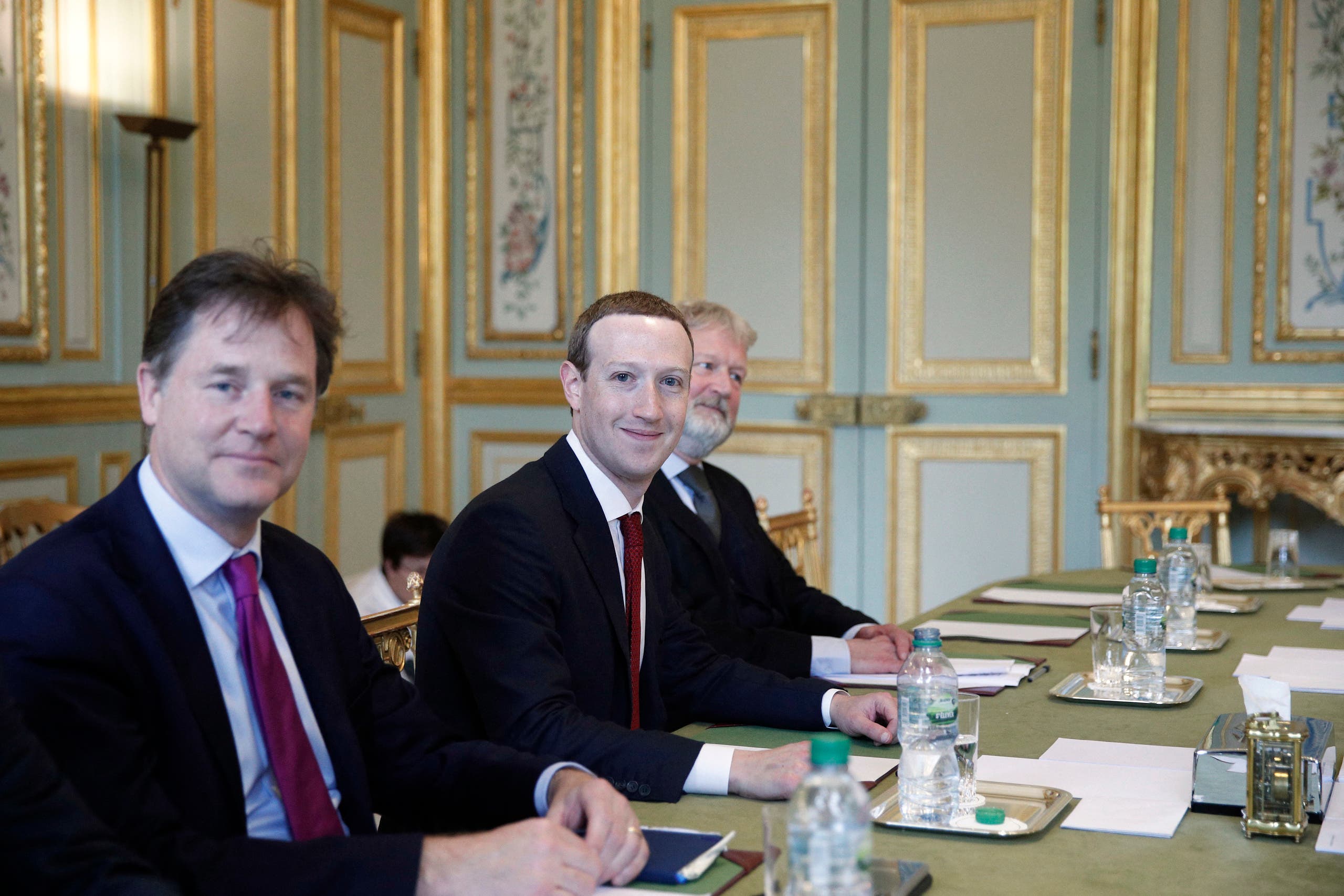 CEO and co-founder of Facebook Mark Zuckerberg poses next to Facebook head of global policy communications and former UK deputy prime minister Nick Clegg (L). (AP)