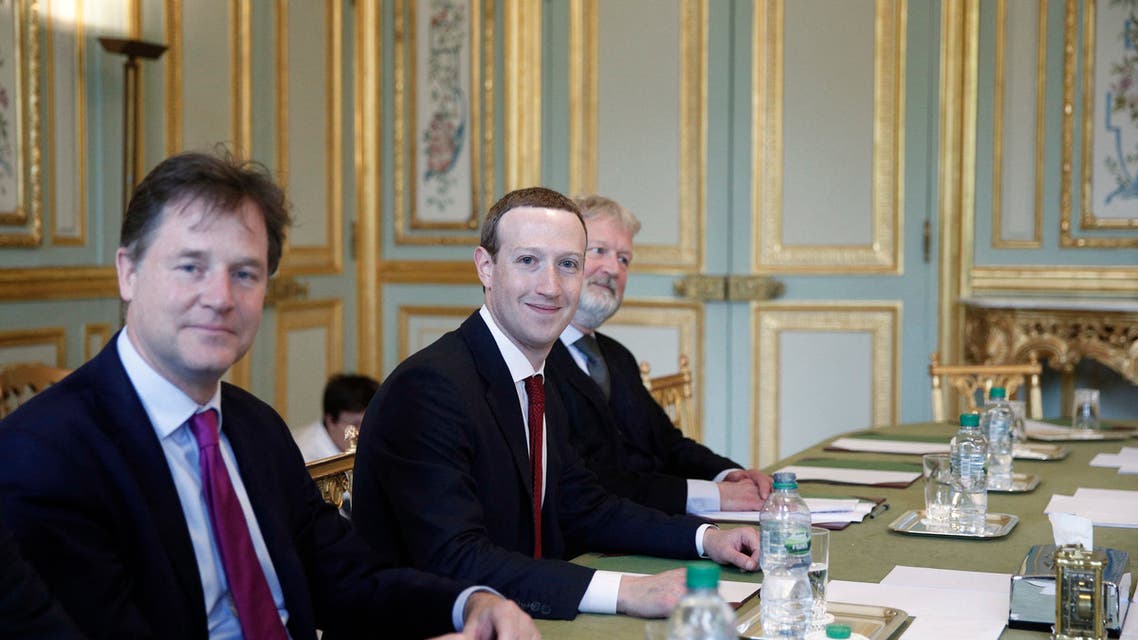 CEO and co-founder of Facebook Mark Zuckerberg poses next to Facebook head of global policy communications and former UK deputy prime minister Nick Clegg (L). (AP)