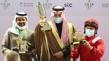 Trainer Fahd Saad, owner Prince Faisal bin Khalid and jockey Wigberto Ramos celebrate after Albathaly wins the Jockey Club Local Handicap at the Saudi Cup – King Abdulaziz Racetrack, Riyadh, Saudi Arabia, February 20, 2021. (File photo: Reuters)