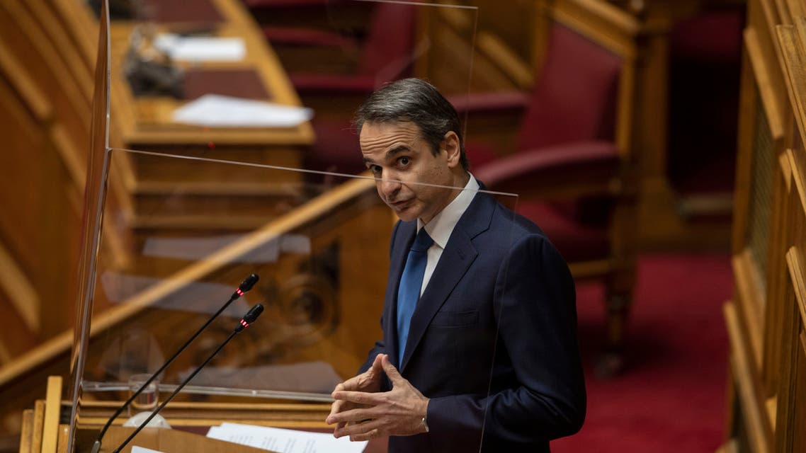 Greek Prime Minister Kyriakos Mitsotakis speaks during a parliamentary session in Athens, Thursday, Feb. 25, 2021. (AP)