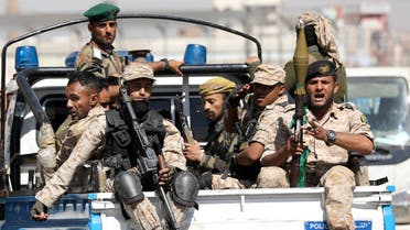 Houthi troops ride on the back of a police patrol truck after participating in a Houthi gathering in Sanaa, Yemen February 19, 2020. REUTERS/Khaled Abdullah