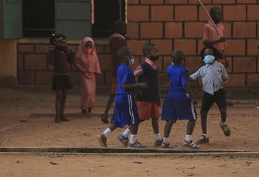 School children play outside as schools reopen in Nigeria amid the coronavirus-disease (COVID-19) outbreak, in Abuja, Nigeria January 18, 2021. (Reuters)
