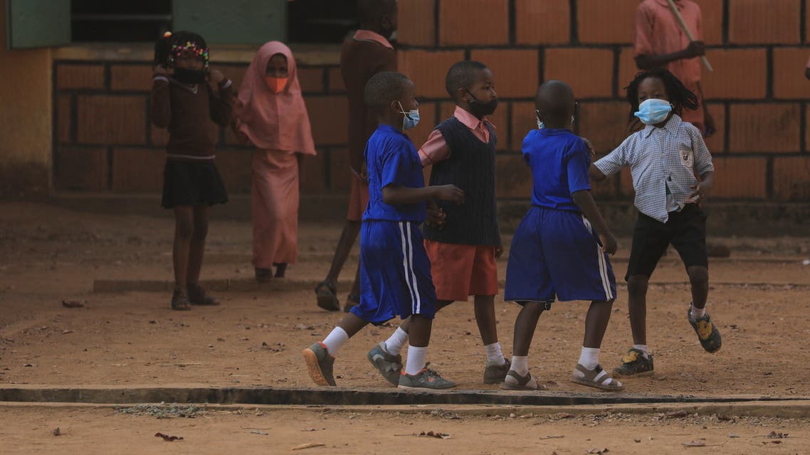 School children play outside as schools reopen in Nigeria amid the coronavirus-disease (COVID-19) outbreak, in Abuja, Nigeria Jan. 18, 2021. (Reuters)