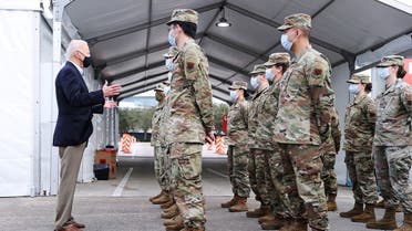 US President Joe Biden addresses troops from a medical unit who are helping to run a vaccination site for the coronavirus disease in, Texas, Feb. 26, 2021. (Reuters)