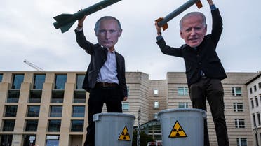 Peace activists wearing masks of Russian President Vladimir Putin (L) and newly elected US President Joe Biden pose with mock nuclear missiles in front of the US embassy in Berlin on January 29, 2021 in an action to call for more progress in nuclear disarmament. The Russian parliament on January 27, 2021 unanimously voted to ratify an agreement to extend by five years a key nuclear pact with the United States that was set to expire soon. Signed in 2010, the New START contract caps to 1,550 the number of nuclear warheads that can be deployed by Moscow and Washington, which control the world's largest nuclear arsenals. The agreement, which was due to expire on February 5, is seen as a rare opportunity for compromise between Moscow and Washington, whose ties have dramatically deteriorated in recent years.