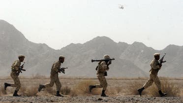 Iranian soldiers participate in military manoeuvres at Sistan-Baluchestan province, some 50 kms east of city of Zahedan near the Pakistani border, 19 August 2006. Iranian armed forces held a massive military maneuver today to test new weapons and tactics against a potential enemy. The first stage of Zolfaghar Blow commenced in the restive southeastern province of Sistan-Baluchestan. The maneuvers will continue in 15 other provinces in northeastern, northwestern, western and southern Iran. AFP PHOTO/FARSNEWS/STR