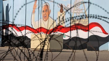 A mural depicting Pope Francis is pictured on the outer walls of Our Lady of Salvation (Sayidat al-Najat) Church in the Iraqi capital Baghdad, on February 22, 2021. (Ahmad al-Rubaye/AFP)