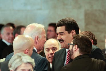 Venezuela's President Nicolas Maduro (2nd R) speaks with US Vice President Joe Biden (C) during the sworn-in ceremony of Brazil's President Dilma Rousseff in Brasilia in this January 1, 2015 handout photo provided by Miraflores Palace. Picture taken January 1, 2015. (Reuters)