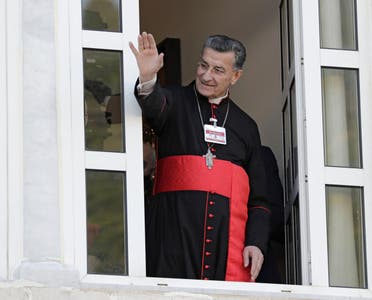Lebanon's Cardinal Mar Bechara Boutros al-Rahi (or Rai) greets supporters ahead of a speech on February 27, 2021 at the Maronite Patriarchate in the mountain village of Bkerki, northeast of Beirut. (AFP)