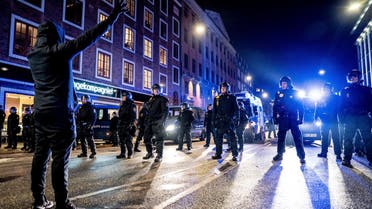 Police face demonstrators during a protest march organised by radical group 'Men in Black Denmark' against restrictions introduced by the Danish government during the COVID-19 pandemic, in Copenhagen on January 23, 2021. (File photo: AFP)