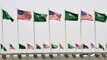 American and Saudi national flags are seen on a main road in Riyadh, on May 19, 2017. (File photo: AFP)